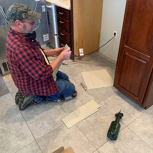 DuringVinylInstallation Vinyl | Battle Creek Tile & Mosaic